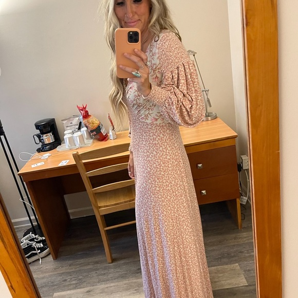 Free People dress size small stretchy material would fit a medium easily. - Picture 2 of 6